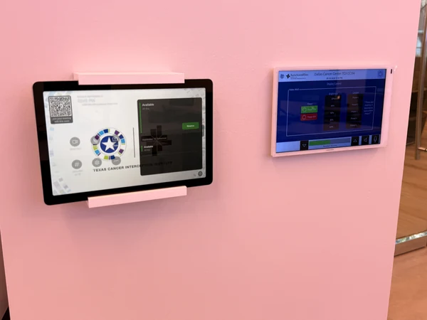 Wall-mounted touch interfaces for command-center collaboration and display control.