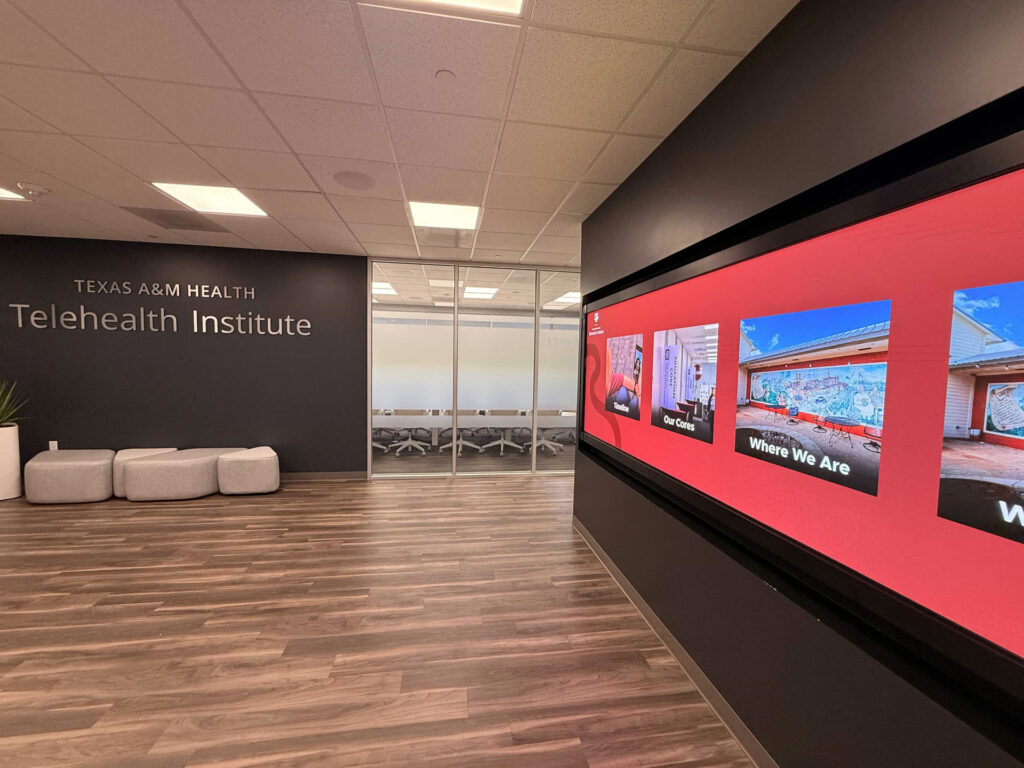 Texas A&M Telehealth Institute lobby entrance with LED video wall