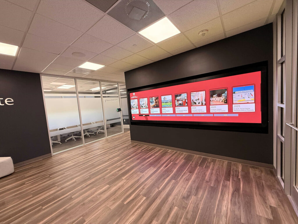 Interactive timeline content on the Texas A&M Telehealth Institute video wall