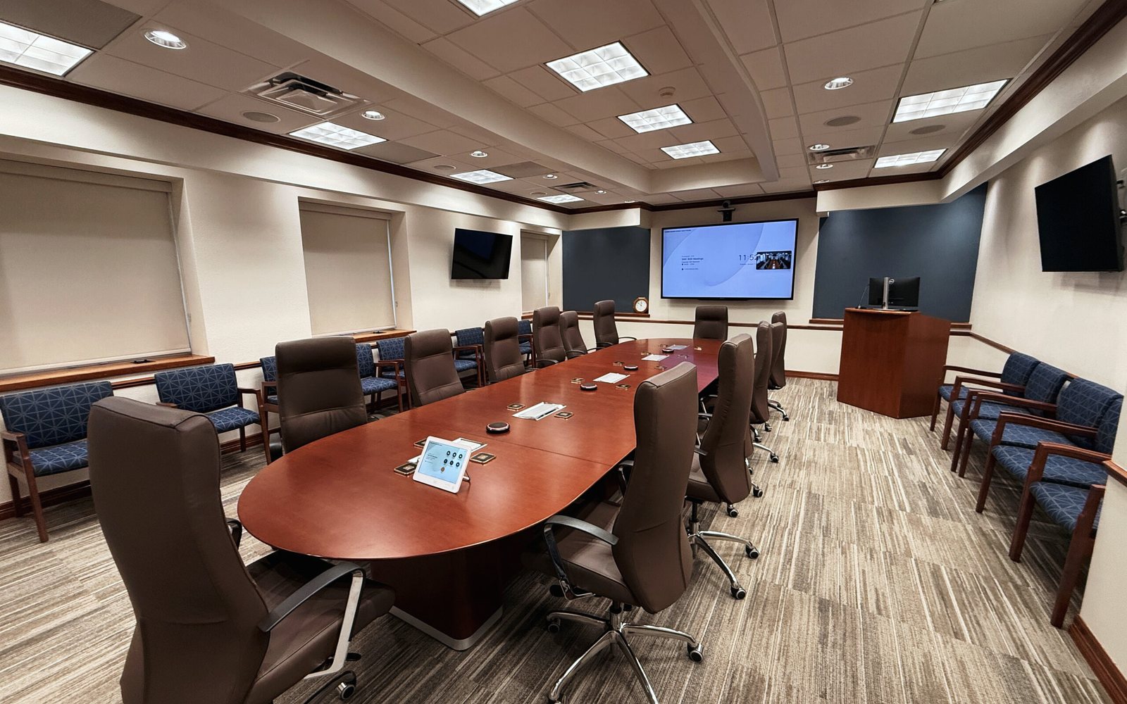 Modern conference room with a large wall display